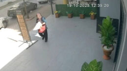 Önce etrafı kolaçan etti, sonra çiçekleri poşete doldurup kaçtı