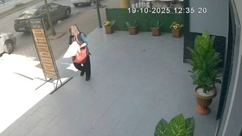 Önce etrafı kolaçan etti, sonra çiçekleri poşete doldurup kaçtı
