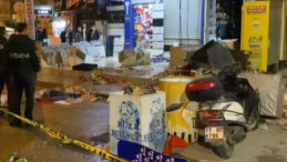 Ailesine ait iş yerini benzin d&ouml;kerek yaktı, annesiyle birlikte yaralandı