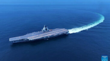 &Ccedil;in'den G&ouml;sterişli Tanıtım: En Gelişmiş Savaş Gemisi Donanmaya Katıldı