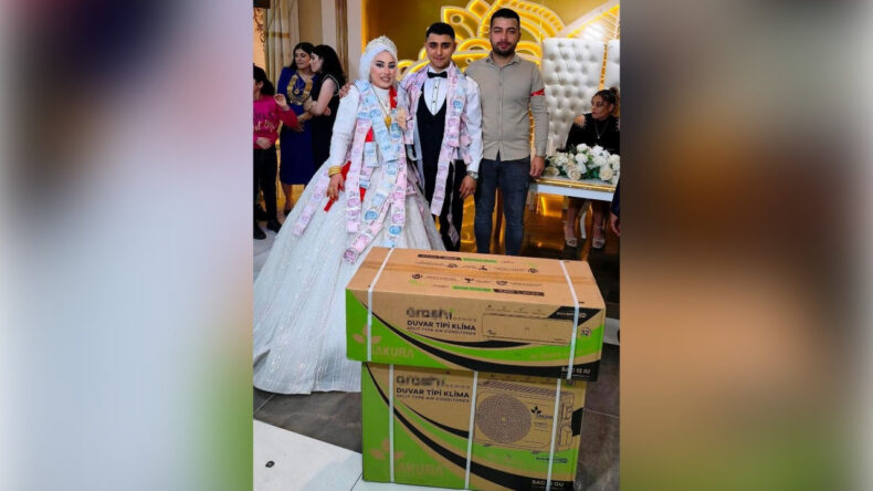 D&uuml;ğ&uuml;n T&ouml;reninde Gelin ve Damada Klima Hediye Edildi