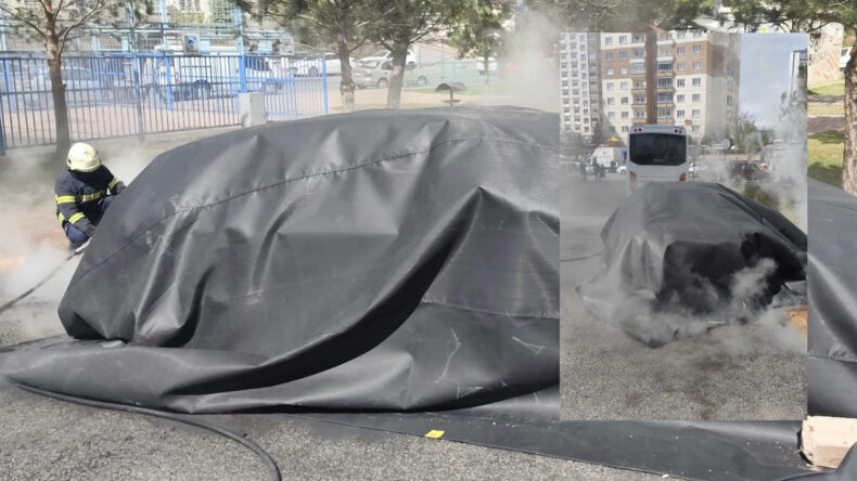 Yanan elektrikli otomobile battaniyeli müdahale