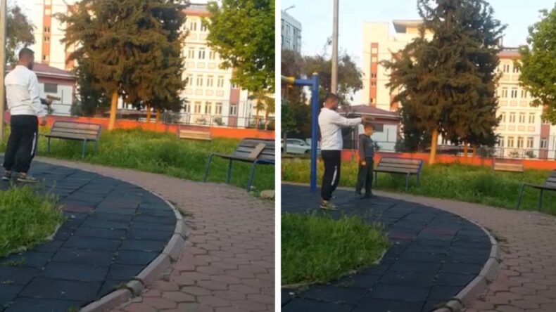 Parkta &Ccedil;ocuğa Oyuncak Silahla Atış Talimi Yaptırdı